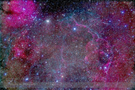 The Vela Supernova Remnant in the centre of the Gum Nebula area of Vela. This is the remains of a star that exploded thousands of years ago. The emission nebula at upper left is Gum 17, at centre left is Gum 18. This is a stack of 10 x 12 minute exposures with the Borg 77mm astrographic apo refractor at f/4.3 (330mm focal length) and the filter-modified Canon 5D Mark II at ISO 800. The image has been highly processed in contrast to bring out the faint nebulosity and arcs of the remnant. Taken from Coonabarabran, Australia March 2014.